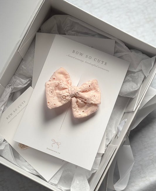 Petite Pinwheel Bow | Blushing Peach Broderie (clip or headband)